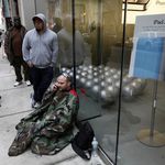 Josh Lehman, seated, is the first in line waiting to purchase an Apple iPad 2 scheduled to go on sale later today, in Philadelphia.